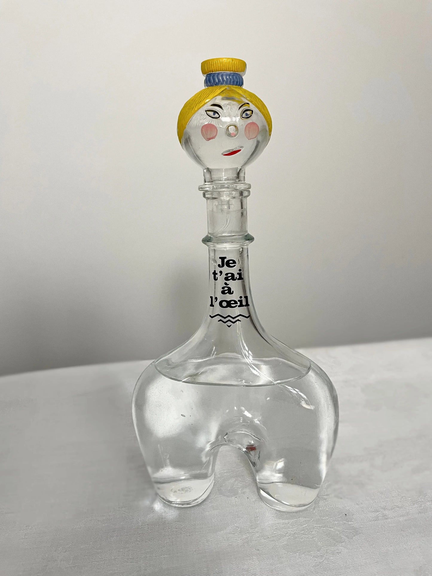 Carafe en verre bouchon visage blonde Ohmabergere